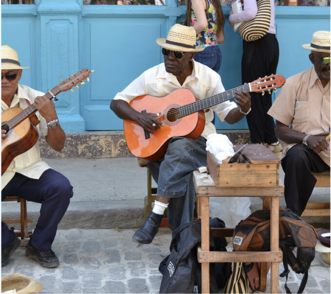 Partial image of musicians in the streets all playing musical instruments