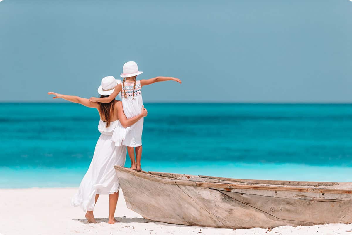 Mom and daughter on a beach in Cuba thanks for the Cuban eVisa